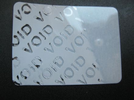 Универсален напечатан защитен гарaнционен етикет "ВНИМАНИЕ! ГАРАНЦИОНЕН СТИКЕР" - тип VOID, 35mm X 26mm, бял